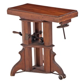 AN ANTIQUE CARVED MAHOGANY FRENCH MECHANICAL STAND OR TABLE