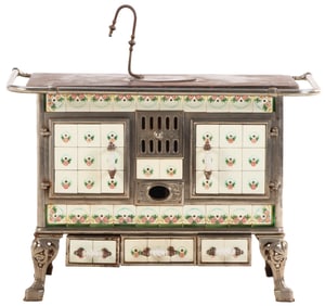 NINETEENTH CENTURY NICKEL OVER IRON AND TILE STOVE.