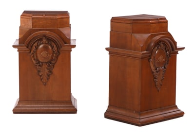 A PAIR OF VICTORIAN WALNUT PEDESTALS EACH WITH CARTOUCHE DECORATION C 1890.