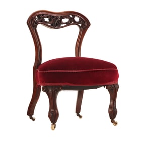 NINETEENTH CENTURY CARVED WALNUT BOUDOIR CHAIR WITH PIERCED CARVED BACK.