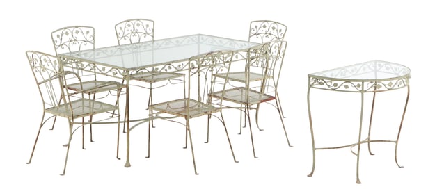 AN IRON AND GLASS SALTERINI STYLE GARDEN OR DECK SET HAVING FLORAL DECORATION.