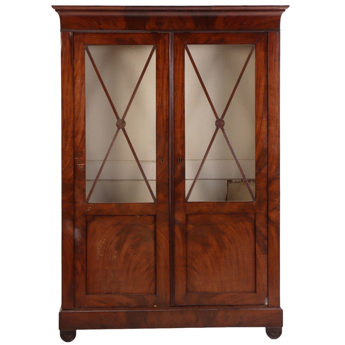 MAHOGANY CHARLES X TWO DOOR BOOKCASE HAVING SIX ADJUSTABLE SHELVES C 1840. DISMANTLES.