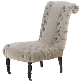 A NAPOLEON III SLIPPER CHAIR HAVING A ROLLED BACK AND BUTTON BACK UPHOLSTERY C 1860.