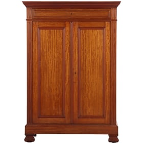 A BELGIAN TWO DOOR AFRICAN MAHOGANY LOUIS PHILIPPE STYLE ARMOIRE C 1860.