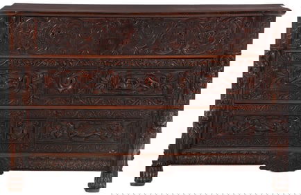 CONTINENTAL CARVED MAHOGANY CHEST OF DRAWERS HAVING HEAVY RELIEF CARVINGS C 1820.