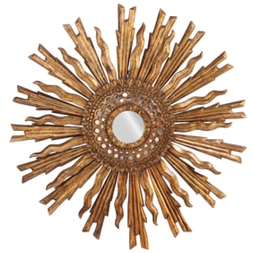 A LARGE FRENCH CARVED AND GILTWOOD SUNBURST MIRROR CIRCA 1960.