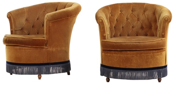A PAIR OF FRENCH UPHOLSTERED TUB CHAIRS HAVING BUTTON BACK UPHOLSTERY AND FRINGE DECORATION CIRCA