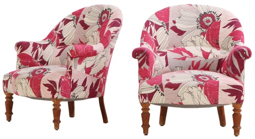 A PAIR OF NAPOLEON III LOUNGE CHAIRS HAVING CONTINUOUS BACK AND WILD FLORAL UPHOLSTERY.