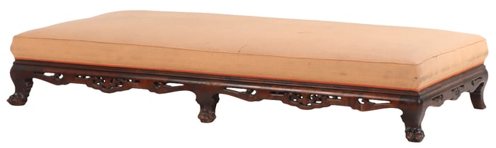 A FRENCH UPHOLSTERED AND CARVED HARDWOOD WINDOW BENCH IN THE MANNER OF GABRIEL VIARDOT CIRCA 1880.