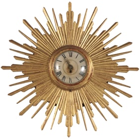 CARVED AND GILTWOOD STAR BURST WALL CLOCK C 1950.