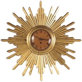 CARVED AND GILTWOOD STAR BURST WALL CLOCK C 1950.