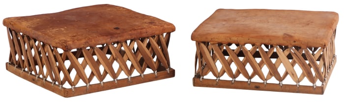 PAIR OF MEXICAN LEATHER OTTOMANS.