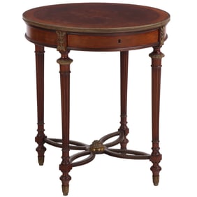 A FRENCH PARQUETRY INLAID AND BRONZE MOUNTED OCCASIONAL TABLE HAVING FLORAL INLAY AND A SINGLE