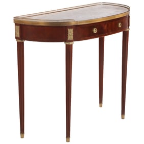A MAHOGANY DEMILUNE CONSOLE TABLE IN THE LOUIS XVI STYLE HAVING TWO DRAWERS, BRONZE MOUNTS AND A