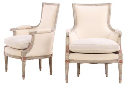 A PAIR OF GREY PAINTED AND PARTIAL GILT LOUIS XVI STYLE BERGERE CHAIRS CIRCA 1940 HAVING RECENT