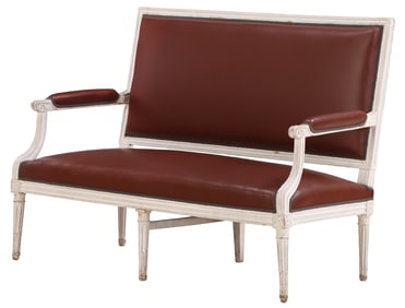 A PAINTED FRENCH LOUIS XVI STYLE OPEN ARMS SETTEE CIRCA 1900 HAVING SIX LEGS