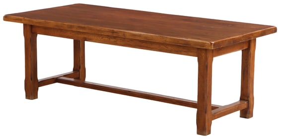 A FRENCH SOLID OAK FARM TABLE HAVING SQUARE CHAMFERED LEGS AND SOLID OAK TOP CIRCA 1960.