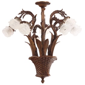 A FRENCH BRASS AND GLASS 9 LIGHT CHANDELIER DEPICTING A BASKET WITH LEAVES.