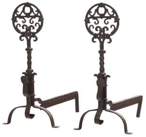 A PAIR OF HAND HAMMERED WROUGHT IRON ANDIRONS WITH CIRCULAR DESIGN C 1910.