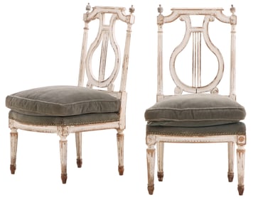 A PAIR OF EARLY 19TH CENTURY FRENCH PAINTED LYRE BACK SIDE CHAIRS.