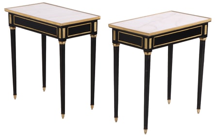 A PAIR OF EBONIZED AND BRONZE MOUNTED MARBLE TOP TABLES IN THE DIRECTOIRE STYLE.
