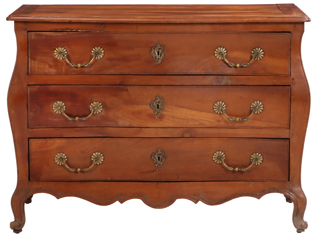 EIGHTEENTH CENTURY FRENCH CHERRY BOMBAY FORM COMMODE HAVING THREE DRAWERS. (1 of 5)