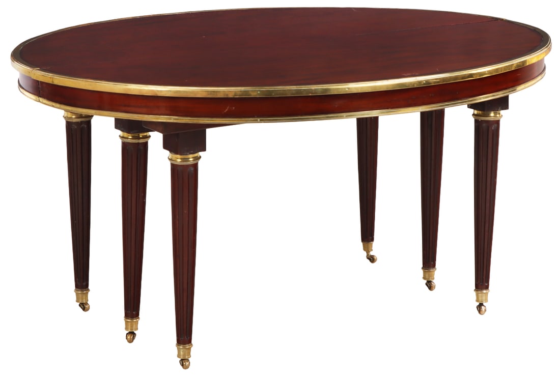 A 19TH CENTURY MAHOGANY BRONZE MOUNTED DINING ROOM TABLE THAT EXTENDS TO 188". TABLE HAS FOUR LEAVES (1 of 7)