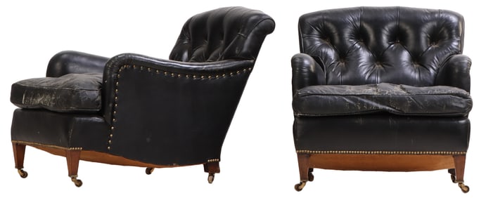 PAIR OF BLACK LEATHER UPHOLSTERED CLUB CHAIRS IN THE MANNER OF JEAN-MICHEL FRANK C 1940.