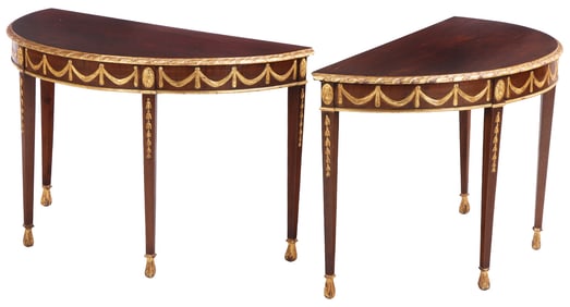 A PAIR OF MAHOGANY AND CARVED GILTWOOD REGENCY STYLE DEMILUNE CONSOLE TABLES.