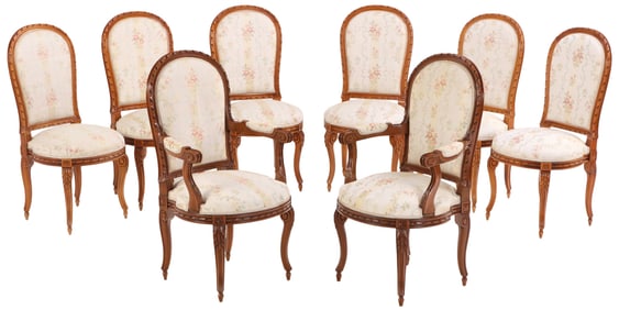 A SET OF EIGHT LOUIS 15 STYLE CARVED AND UPHOLSTERED DINING ROOM CHAIRS INCLUDING TWO