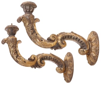 A PAIR OF LARGE ITALIAN BAROQUE STYLE CARVED GILTWOOD AND GESSO WALL SCONCES C. 19TH CENTURY.