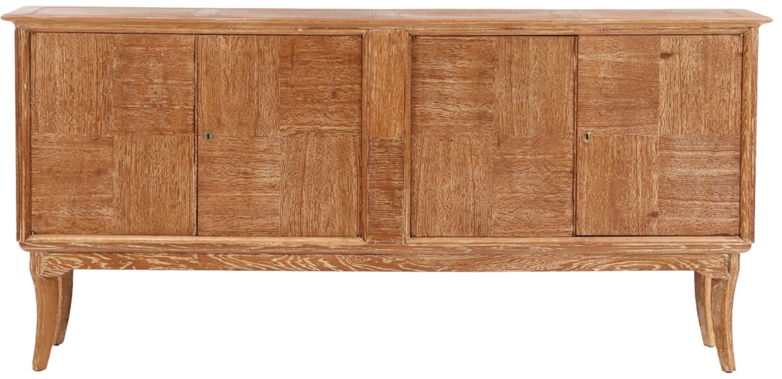 A FOUR DOOR CERUSED OAK SIDEBOARD HAVING SUBTLE PATCHWORK DESIGN AND FOUR INTERIOR DRAWERS C 1945. (1 of 6)