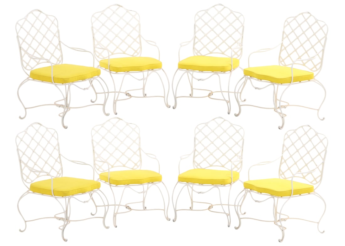 EIGHT LARGE PAINTED IRON ARM CHAIRS WITH CROSS HATCH DESIGN AND LOOSE CUSHION UPHOLSTERY. (1 of 6)