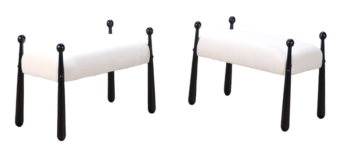 PAIR OF EBONIZED AND UPHOLSTERED BAT FORM BENCHES IN THE MANNER OF JEAN ROYERE HAVING A NEW BOUCLE: Pair of ebonized and upholstered bat form benches in the manner of Jean Royere having a new boucle type fabric. Ht: 23.5" Wd: 32.5" Dpth: 16.5"
