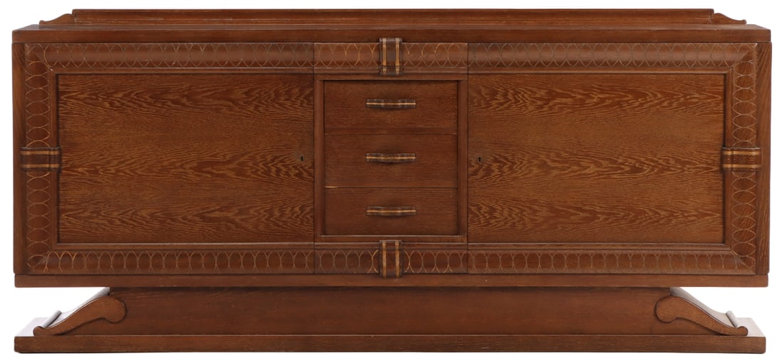 FRENCH CERUSED OAK SIDEBOARD HAVING TWO DOORS FLANKING FOUR DRAWERS C 1940. (1 of 8)