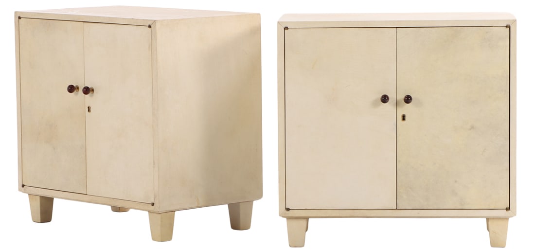 PAIR OF PARCHMENT COVERED CABINETS C 1960 EACH HAVING TWO DOORS.: Pair of parchment covered cabinets C 1960 each having two doors. Ht: 29.5" Wd: 30.5" Dpth: 20"