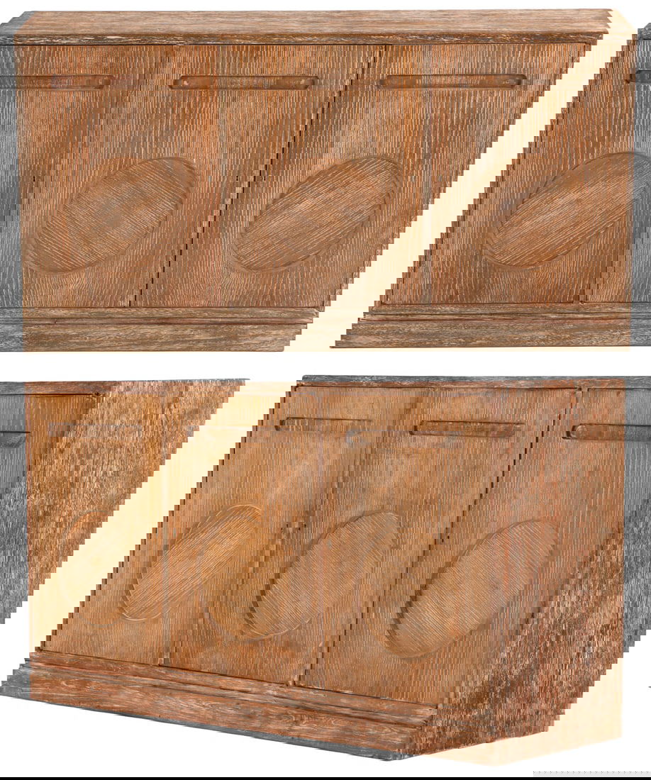 A PAIR OF THREE DOOR CERUSED OAK SIDEBOARDS WITH CIRCULAR MOTIF C 1950.: A pair of three door cerused oak sideboards with circular motif C 1950. Ht: 35" Wd: 66.25" Dpth: 19.75"