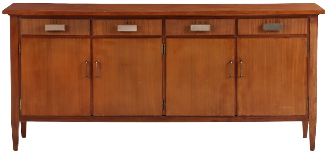 A MID CENTURY MODERN MAHOGANY SIDEBOARD IN THE STYLE OF DUNBAR HAVING FOUR DRAWERS OVER FOUR: A mid century modern mahogany sideboard in the style of Dunbar having four drawers over four doors circa 1950. Ht: 35" Wd: 78.75" Dpth: 22.75"