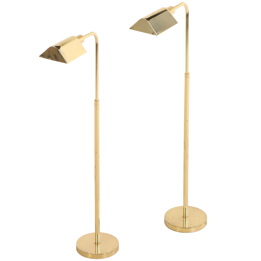 PAIR OF ADJUSTABLE BRASS FLOOR LAMPS WITH ROUND BASE C 1975. (1 of 5)