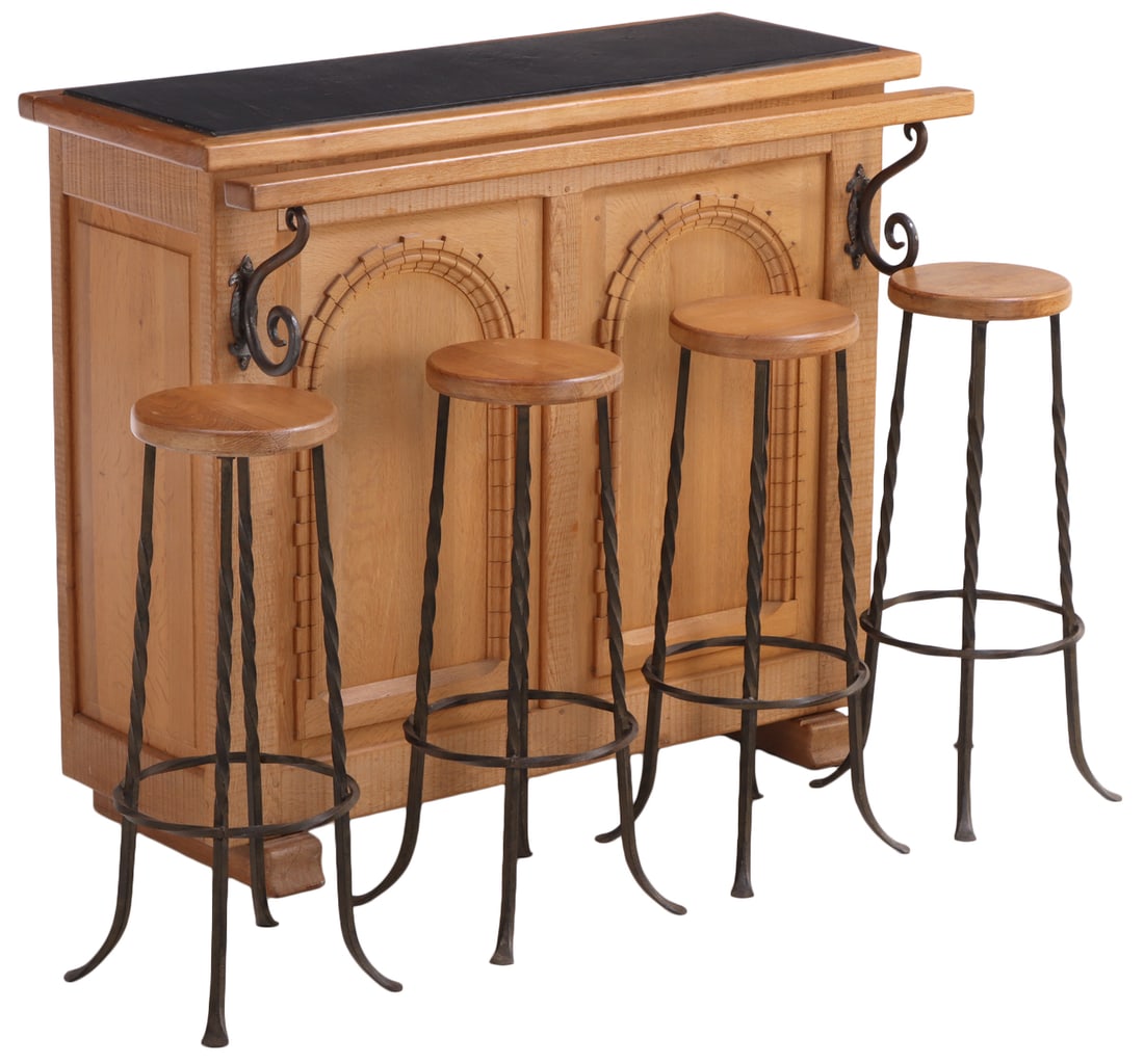 FRENCH OAK BAR COUNTER WITH SLATE TOP ALONG WITH FOUR MATCHING OAK AND IRON BAR STOOLS C 1965.: French oak bar counter with slate top along with four matching oak and iron bar stools C 1965. Stool- Ht: 33", Wd: 19", Dpth: 19". Ht: 45.25" Wd: 53.25" Dpth: 24.5"