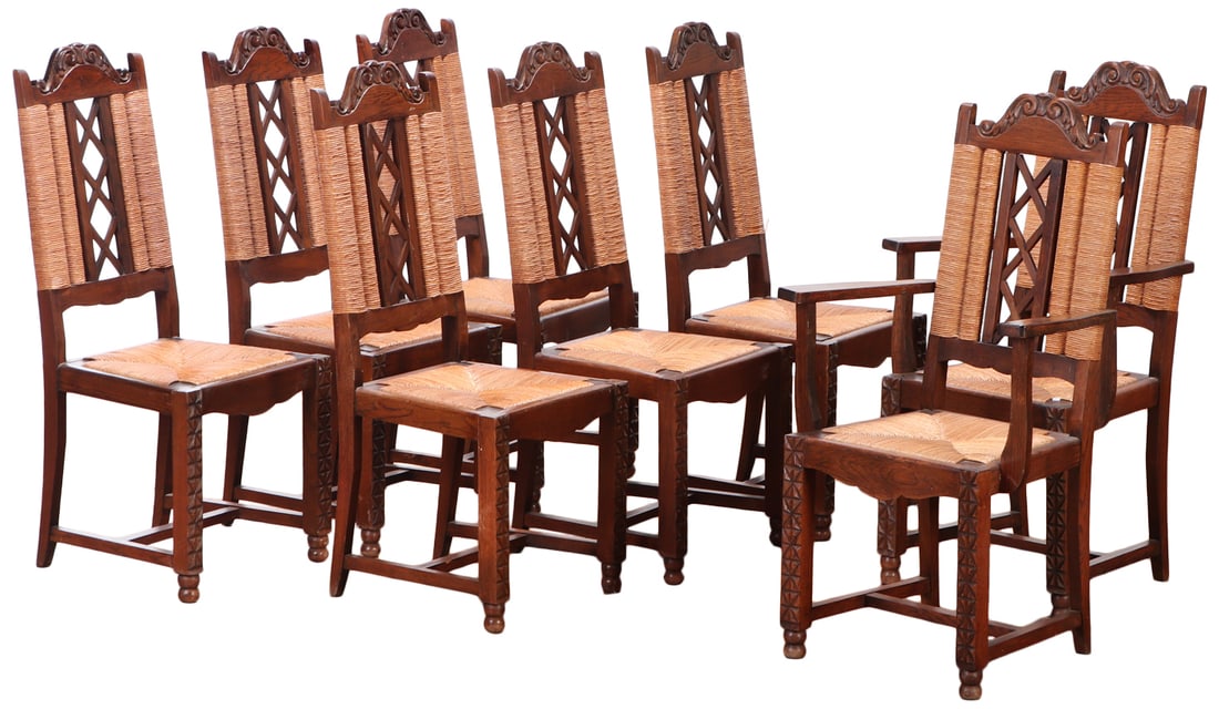 EIGHT FRENCK OAK AND RUSH DINING CHAIRS INCLUDING TWO ARM CHAIRS IN THE MANNER OF DUDOUYT C 1940. (1 of 7)