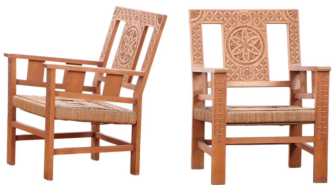 A PAIR OF FRENCH HEAVILY CARVED ARM CHAIRS HAVING RUSH SEATS IN THE MOORISH TASTE CIRCA 1960. (1 of 8)