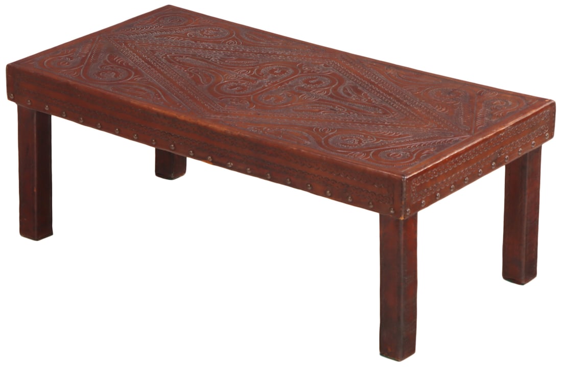 AN EMBOSSED LEATHER COVERED COFFEE TABLE C 1960. (1 of 5)
