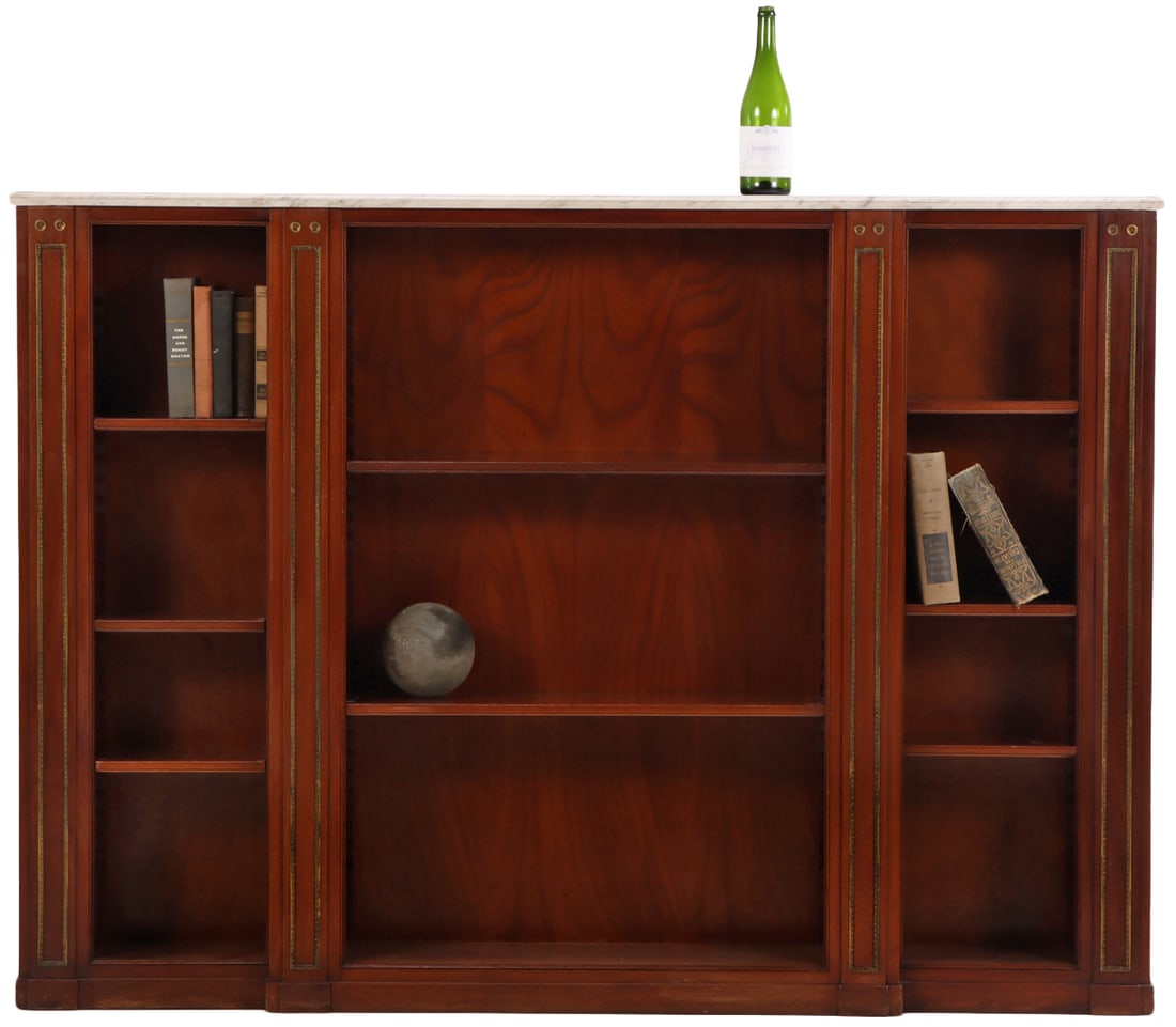 MAHOGANY BRONZE MOUNTED MARBLE TOP OPEN BOOKCASE C 1940 BY JANSEN. BRANDED AND NUMBERED.: Mahogany bronze mounted marble top open bookcase C 1940 by Jansen. Branded and numbered. Ht: 51.25" Wd: 71.5" Dpth: 11.75"