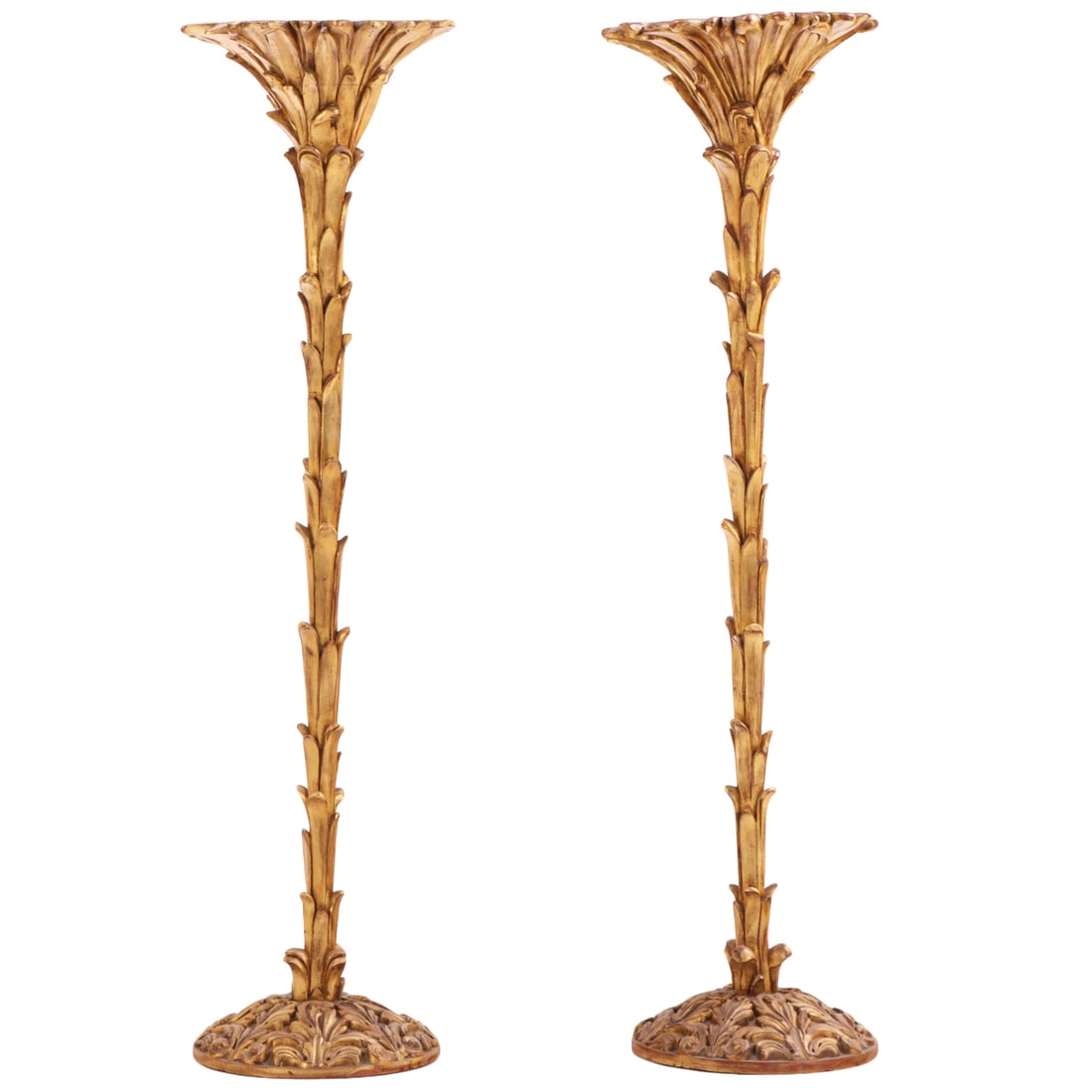 PAIR OF CARVED AND GILTWOOD TORCHIERES.: Pair of carved and giltwood torchieres. Ht: 72.5" Wd: 19" Dpth: 19"