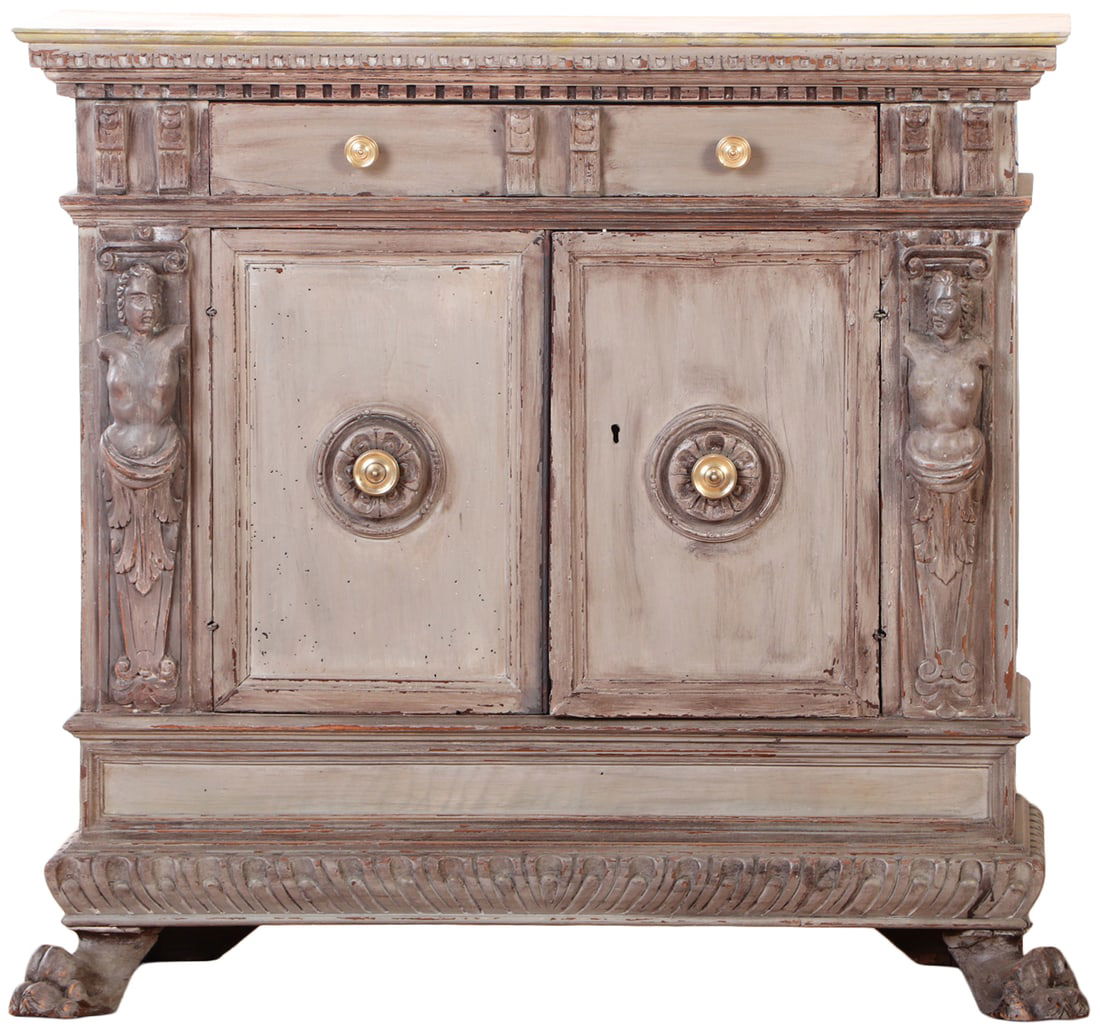 EIGHTEENTH CENTURY ITALIAN TWO DOOR CREDENZA ON CLAW FEET WITH FIGURAL CARVINGS.: Eighteenth century Italian two door credenza on claw feet with figural carvings. Ht: 37.75" Wd: 40" Dpth: 16.75"