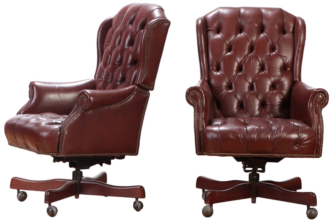 PAIR OF LEATHER BUTTON BACK SWIVEL DESK CHAIRS. (1 of 9)
