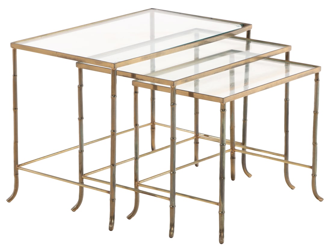 NEST OF THREE FRENCH BRASS AND GLASS FAUX BAMBOO STYLE TABLES IN THE MANNER OF JANSEN C 1960.: Nest of three French brass and glass faux bamboo style tables in the manner of Jansen C 1960. Middle- Ht: 15", Wd: 18.5", Dpth: 12". Low- Ht: 13.75", Wd: 15.5", Dpth: 11". Ht: 16.25" Wd: 21.5" Dpth: 1