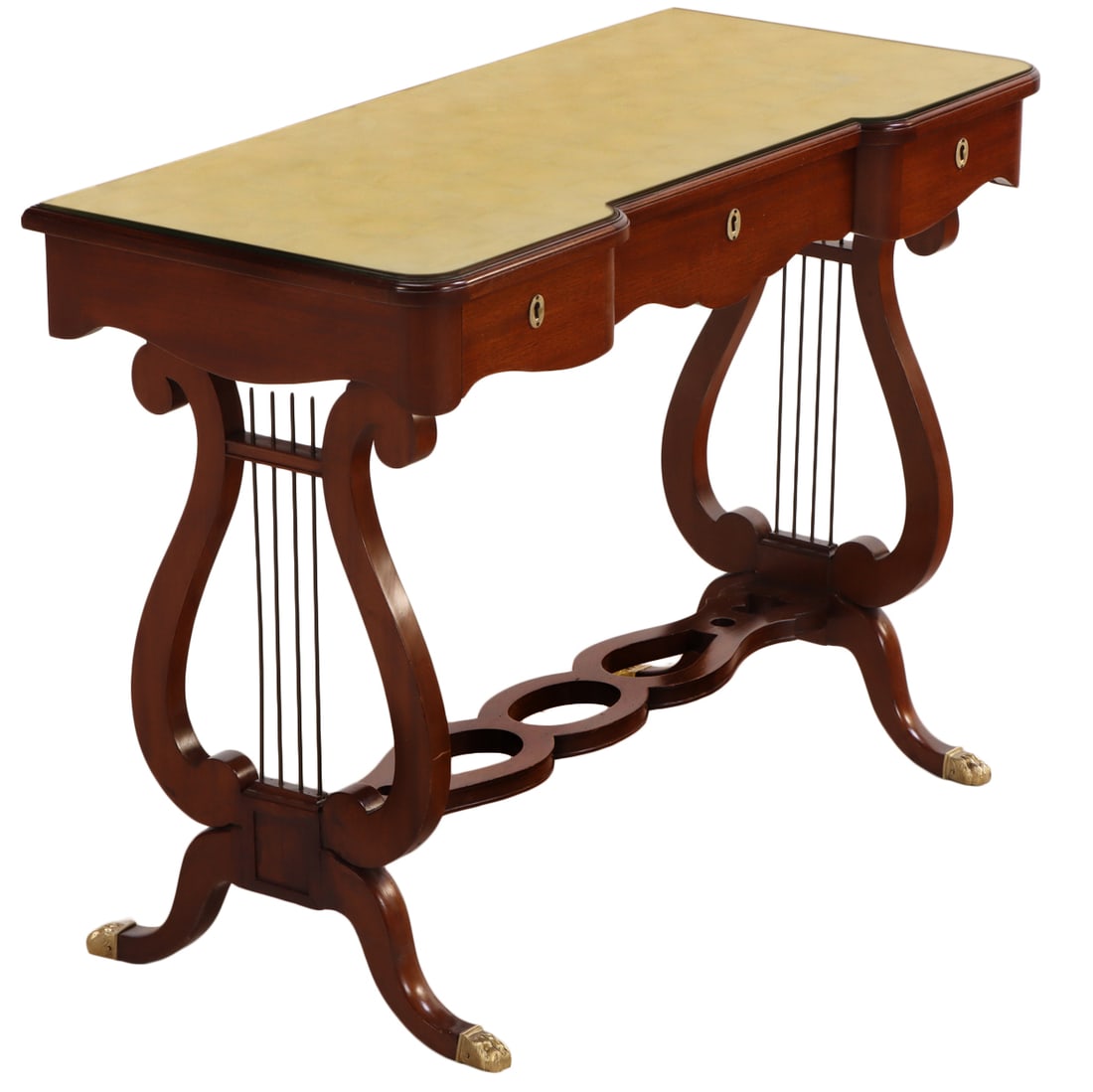 MAHOGANY LYRE FORM CONSOLE TABLE HAVING THREE DRAWERS AND INSET GOLD GILT GLASS TOP ATTRIBUTED: Mahogany lyre form console table having three drawers and inset gold gilt glass top attributed to Nordiska C 1940. Ht: 29.5" Wd: 40" Dpth: 18.5"