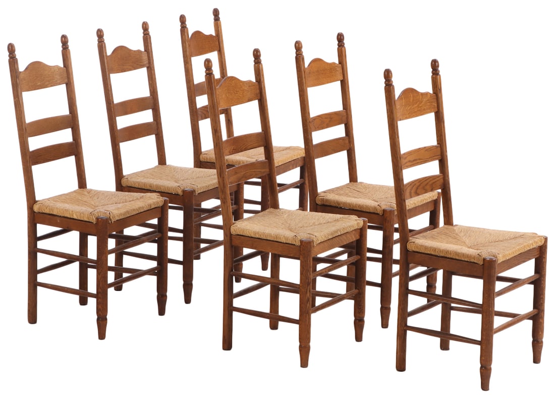 SIX FRENCH OAK AND RUSH DINING CHAIRS C 1950.: Six French oak and rush dining chairs C 1950. Ht: 41.25" Wd: 17.75" Dpth: 18.25" Seat: 18.5"